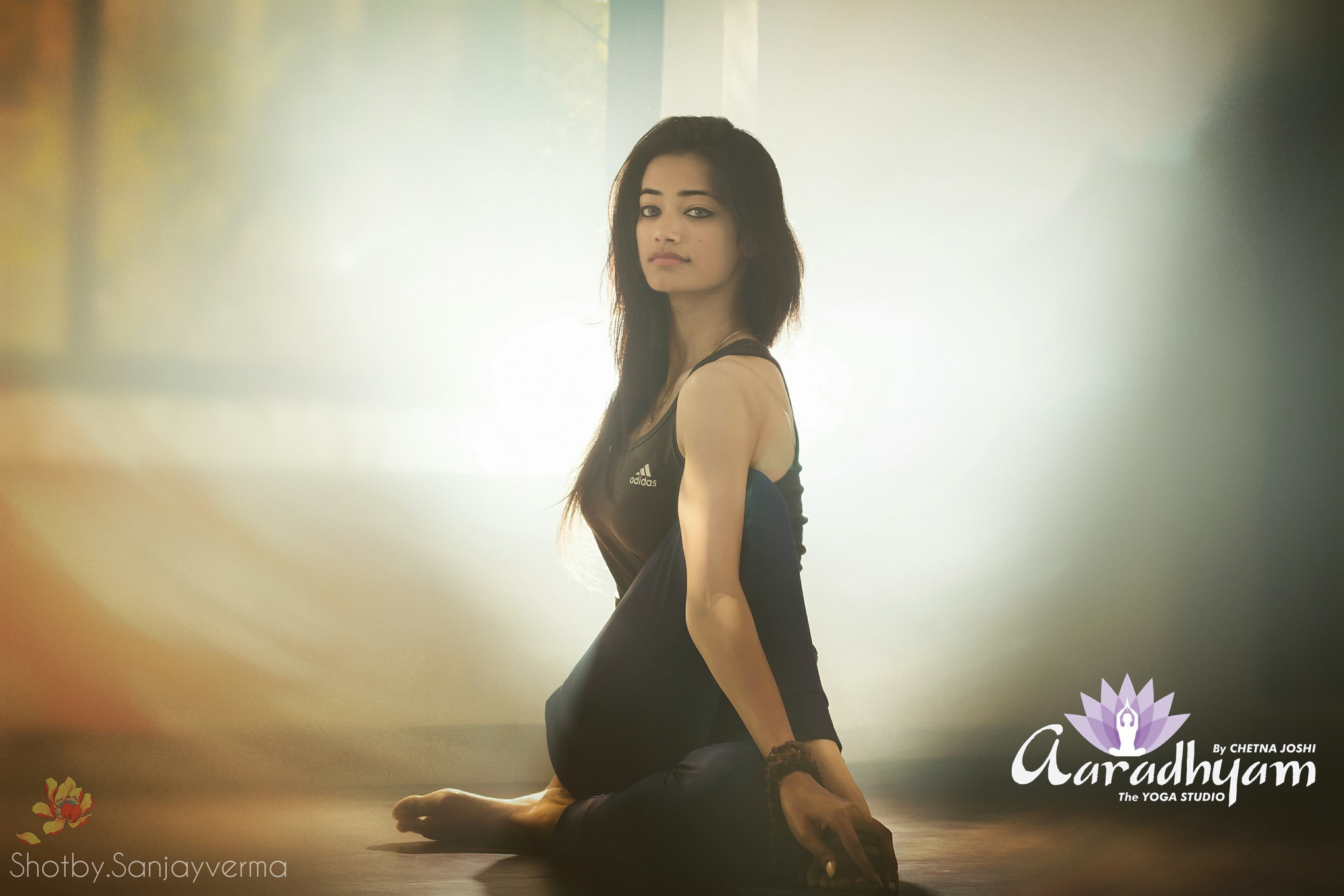 Chetna in matsyasana with Aaradhyam Yog branding